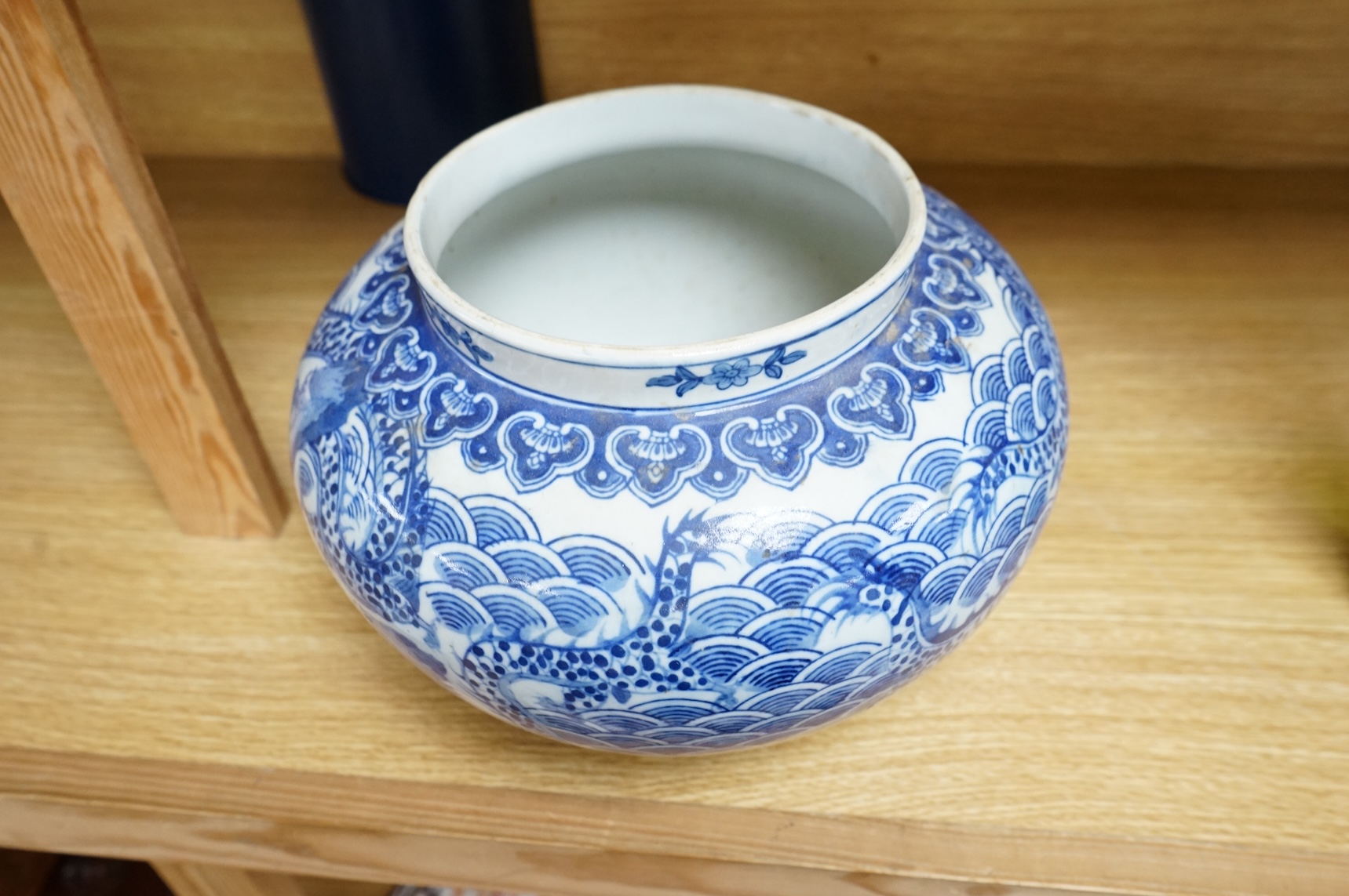 A Chinese blue and white ‘dragon’ bowl, 19cm high